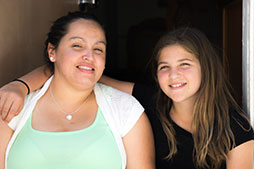 Photo of two girls smiling. Links to Gifts of Cash, Checks, and Credit Cards